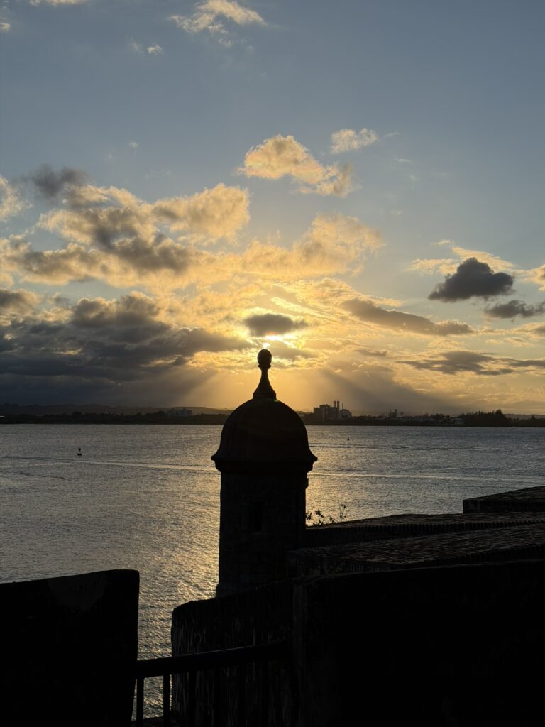 Historic garita overlooking the water and sailboats at sunset in Old San Juan 2