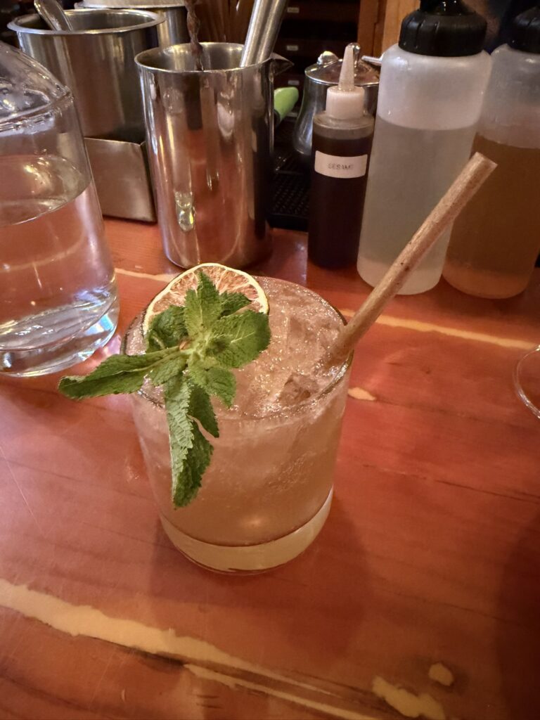 Ginger mocktail served at the bar at Au Pied de Cochon in Montreal